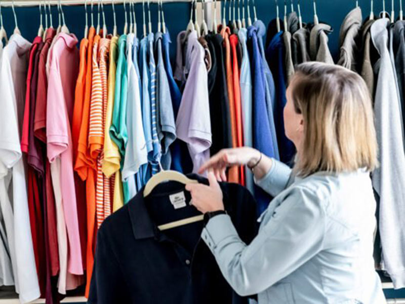 A women selecting a dress